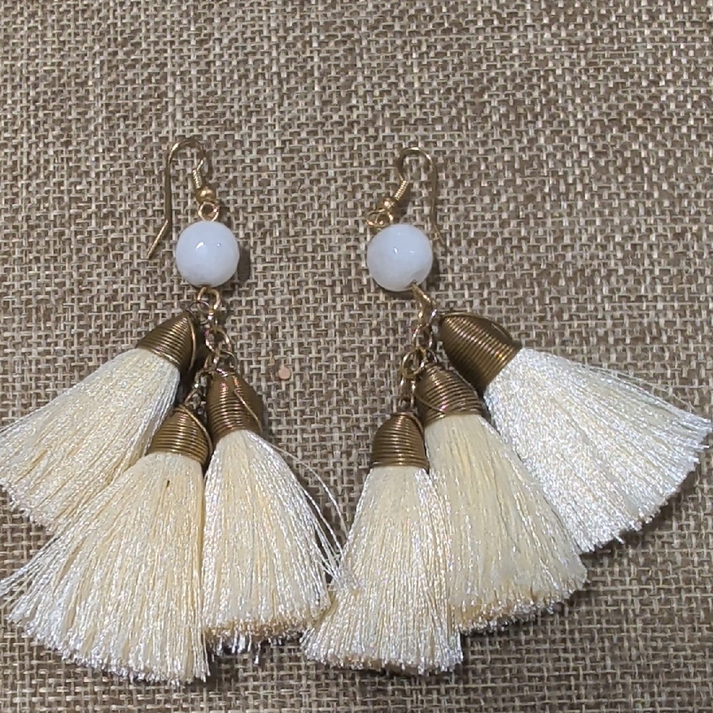 Bohemian Fringe Ivory tassel earrings with gold-tone accents and white beads